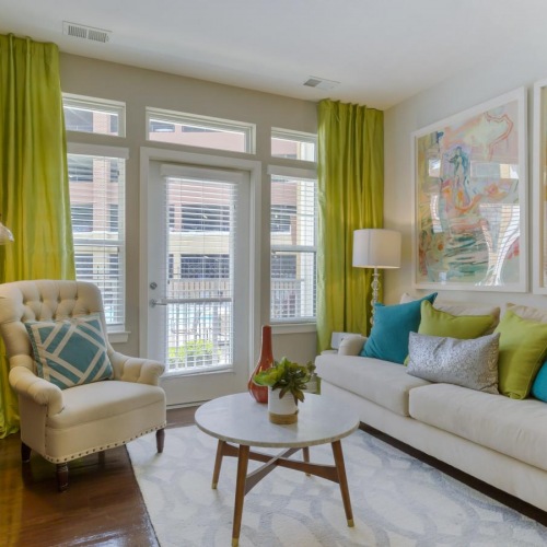 a living room with a couch and a table